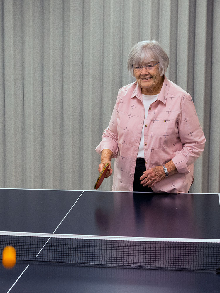 Marie loves to play ping pong